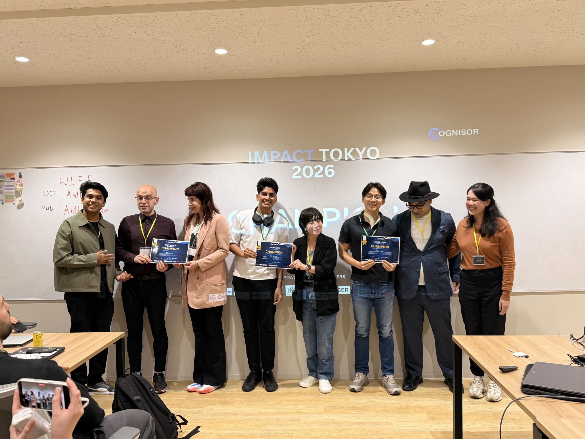 Hackathon and team moment 11 at a Cognisor AI event